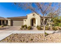 Single-story home with a two-car garage and desert landscaping at 5720 S Wildrose --, Mesa, AZ 85212