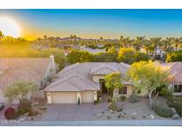 Luxury home with desert landscaping, pool, and mountain views at 9690 N 117Th Way, Scottsdale, AZ 85259