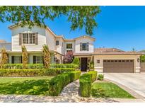 Two-story house with a landscaped lawn and walkway at 2976 E Cullumber St, Gilbert, AZ 85234