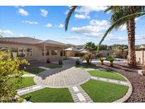 Landscaped backyard oasis with pool and patio at 19146 W Pasadena Ave, Litchfield Park, AZ 85340