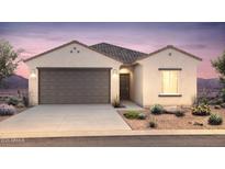 One-story home with two-car garage and desert landscaping at 25144 W Weir Ave, Buckeye, AZ 85326