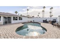 Inviting kidney-shaped pool in a sunny backyard at 2818 S Cottonwood Dr, Tempe, AZ 85282