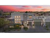 Stunning modern home with two-car garage and landscaped front yard at 10929 E North Ln, Scottsdale, AZ 85259