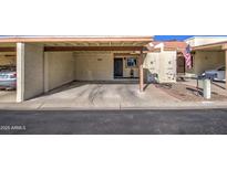 Condo exterior featuring carport and private entrance at 13408 N 25Th Dr, Phoenix, AZ 85029