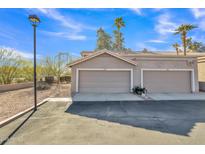 Two-car garage with ample parking space at 4102 E Ray Rd # 1006, Phoenix, AZ 85044