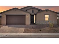 Charming single-Gathering home with a two-car garage and neutral stucco exterior at 4847 W Hunter Trl, San Tan Valley, AZ 85144