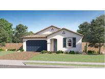 Single-story home with a blue garage door and landscaping at 1434 W Ridge Rd, Apache Junction, AZ 85120