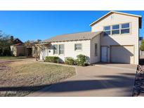 Charming single-story home with a well-maintained lawn and driveway at 2232 N 13Th St, Phoenix, AZ 85006