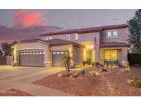 Two-story house with landscaped yard and three-car garage at 2921 S Martingale Rd, Gilbert, AZ 85295