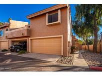 Attached garage with space for one car and extra storage at 5640 E Bell Rd # 1101, Scottsdale, AZ 85254