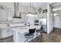 Modern kitchen with stainless steel appliances and island at 18844 E Blue Sky Dr, Rio Verde, AZ 85263