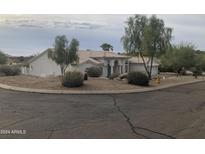 Single-story home with a tile roof and desert landscaping at 15869 E Ponderosa Dr, Fountain Hills, AZ 85268