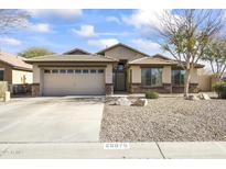 One-story house with a two-car garage and desert landscaping at 29875 N Sedona Pl, San Tan Valley, AZ 85143