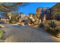 Stunning desert contemporary home with a large circular driveway and beautiful landscaping at 9839 E Madera E Dr, Scottsdale, AZ 85262