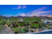 Luxury home with mountain views and landscaped grounds at 12424 E Poinsettia Dr, Scottsdale, AZ 85259