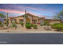 Stunning desert contemporary home with landscaped grounds and a three-car garage at 14216 E Desert Cove Ave, Scottsdale, AZ 85259