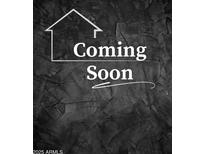 Image shows text 'Coming Soon' with house icon at 24638 W Romley Rd, Buckeye, AZ 85326