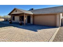 House exterior with a paved driveway and desert landscaping at 2533 W Tanya Rd, Phoenix, AZ 85086