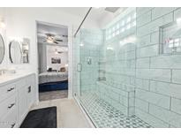 Elegant bathroom with a large walk-in shower and double vanity at 6592 E Casa De Leon Ln, Gold Canyon, AZ 85118