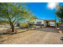 Ranch style home with carport and spacious yard at 1471 E 22Nd Ave, Apache Junction, AZ 85119