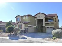 Two-story house with landscaped yard, two-car garage, and neutral color scheme at 23306 N 40Th Pl, Phoenix, AZ 85050