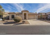 Single-story home with a tile roof and landscaped front yard at 6307 S Palo Blanco Dr, Gold Canyon, AZ 85118