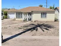 Ranch style home with a large yard and mature landscaping at 2160 E Corona Ave, Phoenix, AZ 85040