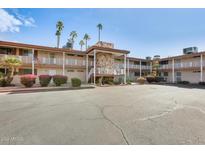 Two-story apartment building with parking and landscaping at 10807 N Fairway W Ct # 212, Sun City, AZ 85351