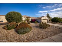 Single-story home with desert landscaping and a two-car garage at 15506 W Skyview Way, Surprise, AZ 85374