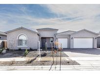 One-story home with two-car garage, desert landscaping, and neutral exterior at 22665 E Stacey Rd, Queen Creek, AZ 85142