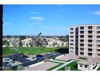 Aerial view of Scottsdale Shadows community, showcasing surrounding landscape and building at 7950 E Camelback Rd # 512, Scottsdale, AZ 85251