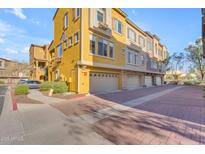 Contemporary townhome with attached garage and paved driveway at 900 S 94Th St # 1066, Chandler, AZ 85224