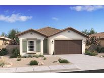 Single-story home with brown garage door and desert landscaping at 7645 W Minton St, Laveen, AZ 85339