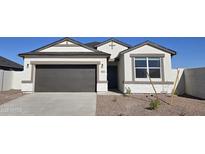 White and gray one-story house with a two-car garage and a small front yard at 5596 E Arctic Ln, San Tan Valley, AZ 85140