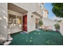Private patio with artificial turf and seating at 2121 S Pennington Rd # 12, Mesa, AZ 85202