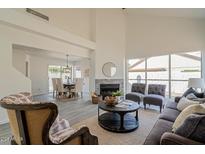 Bright living room with fireplace and ample natural light at 19241 N 4Th Pl, Phoenix, AZ 85024