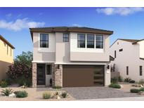 Two-story home with modern design, brown garage door, and stone accents at 2090 N Woodburne Pl, Chandler, AZ 85224