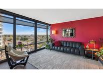 Spacious living room with floor to ceiling windows and city views at 4808 N 24Th St # 803, Phoenix, AZ 85016