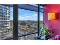 Bright living room with floor-to-ceiling windows and city views at 4808 N 24Th St # 803, Phoenix, AZ 85016