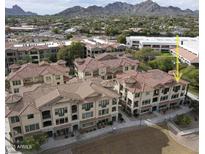 Luxury community near mountains, featuring multiple buildings with Spanish-style architecture at 7275 N Scottsdale Rd # 1001, Paradise Valley, AZ 85253