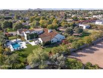 Aerial view of the estate showcasing the pool, outdoor spaces, and lush landscaping at 5203 N Monte Vista Dr, Paradise Valley, AZ 85253