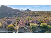 Single-story home with red tile roof and mountain views at 7575 E Camino Salida Del Sol --, Scottsdale, AZ 85266