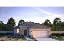 Single-story home with a gray exterior, tile roof, and landscaped yard at 17066 W Seldon Ln, Waddell, AZ 85355