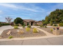 Single-story home with stone accents and landscaped front yard at 280 N 159Th St, Gilbert, AZ 85234