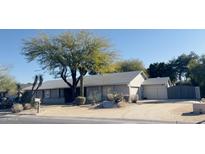 Brick ranch house with desert landscaping and a two-car garage at 2935 W Kristal Way, Phoenix, AZ 85027