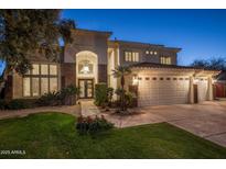 Stunning two-story home with brick accents and a three-car garage at 7040 N 1St Ave, Phoenix, AZ 85021