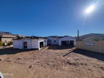 New construction home exterior; single story, under construction with attached garage at 4215 S Willow Springs Trl, Gold Canyon, AZ 85118