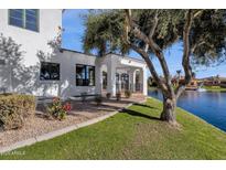 Lakefront house with manicured landscaping at 1777 W Ocotillo Rd # 23, Chandler, AZ 85248