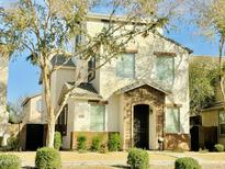 Two-story house with stone accents and landscaping at 4332 E Oakland St, Gilbert, AZ 85295