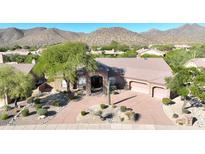 Luxury home with desert landscaping and mountain views at 12238 E Poinsettia Dr, Scottsdale, AZ 85259